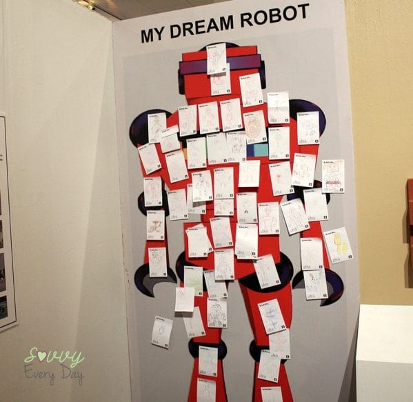 Kids drew their dream robot, then posted it on the wall to share.