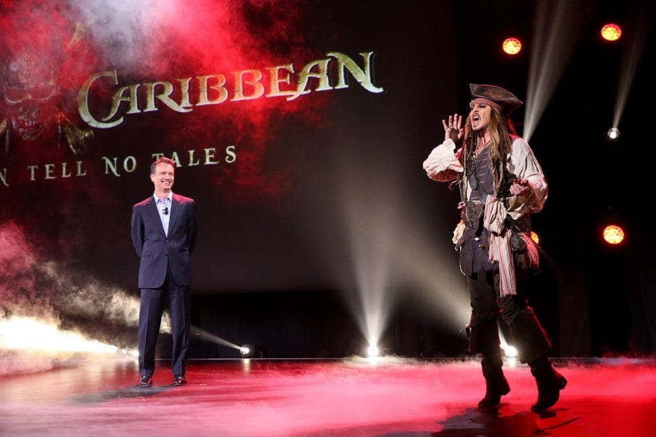 ANAHEIM, CA - AUGUST 15: President of Walt Disney Studios Motion Picture Production Sean Bailey (L) and actor Johnny Depp, dressed as Captain Jack Sparrow, of PIRATES OF THE CARIBBEAN: DEAD MEN TELL NO TALES took part today in "Worlds, Galaxies, and Universes: Live Action at The Walt Disney Studios" presentation at Disney's D23 EXPO 2015 in Anaheim, Calif. (Photo by Jesse Grant/Getty Images for Disney) *** Local Caption *** Johnny Depp; Sean Bailey