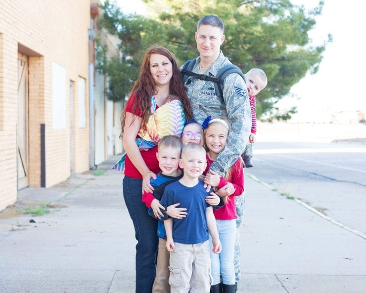 military family photo with tree