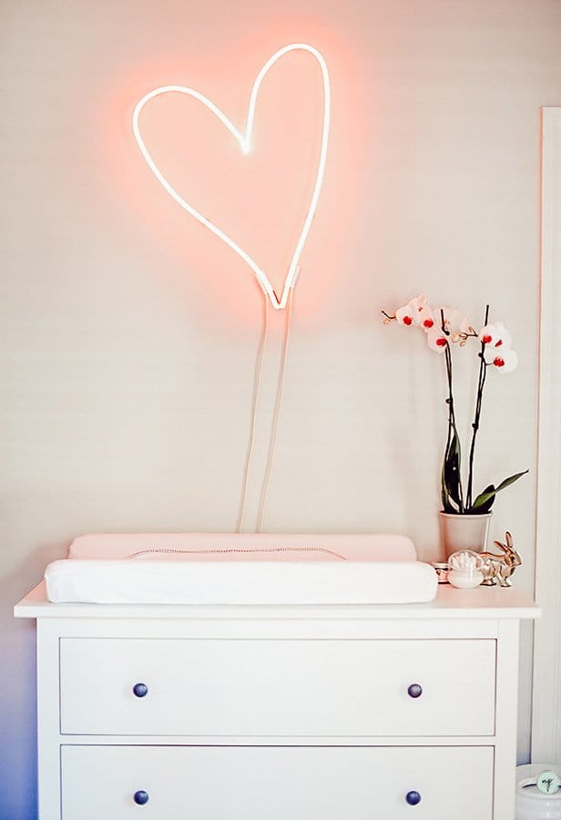 Custom heart-shaped LED light in Wonderland nursery room