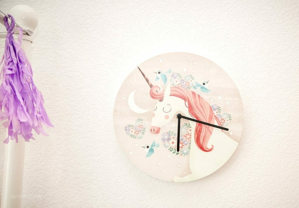Mouse + Magpie Unicorn Ride Clock on the wall