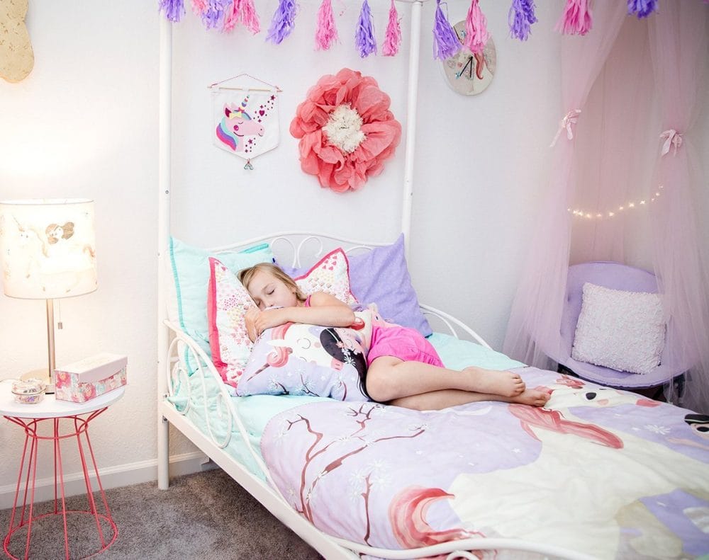 S sleeping in her unicorn room