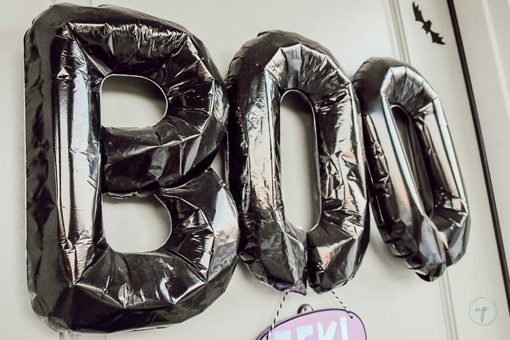 Halloween "Boo" sign made of black balloons