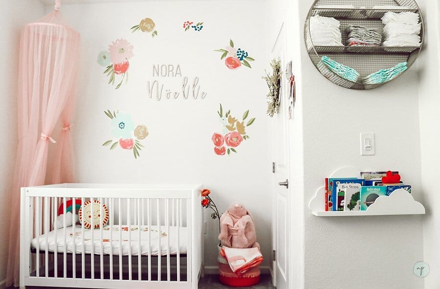 wide shot of floral bohemian nursery room