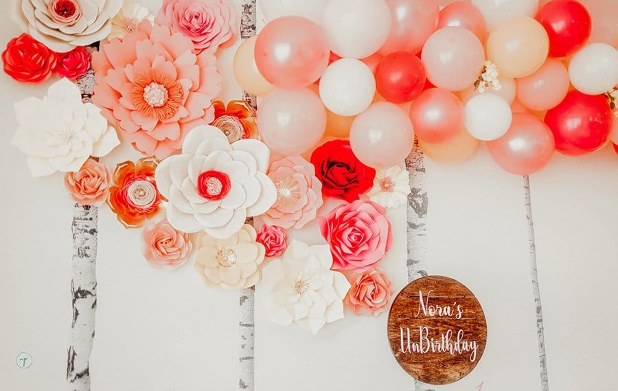 Wonderland birthday wall flowers and balloons