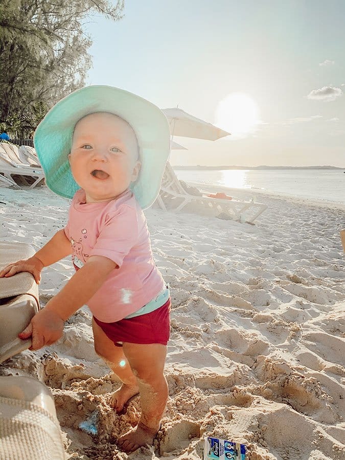 teething baby at the beach with orajel