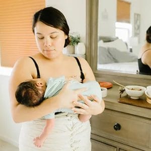 postpartum mom in belly bind
