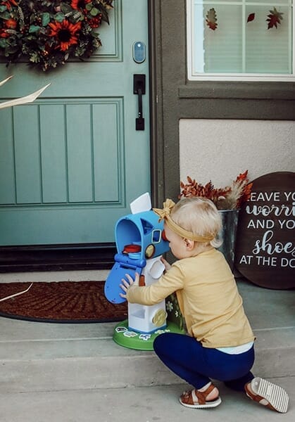 toddler opens learning mailbox