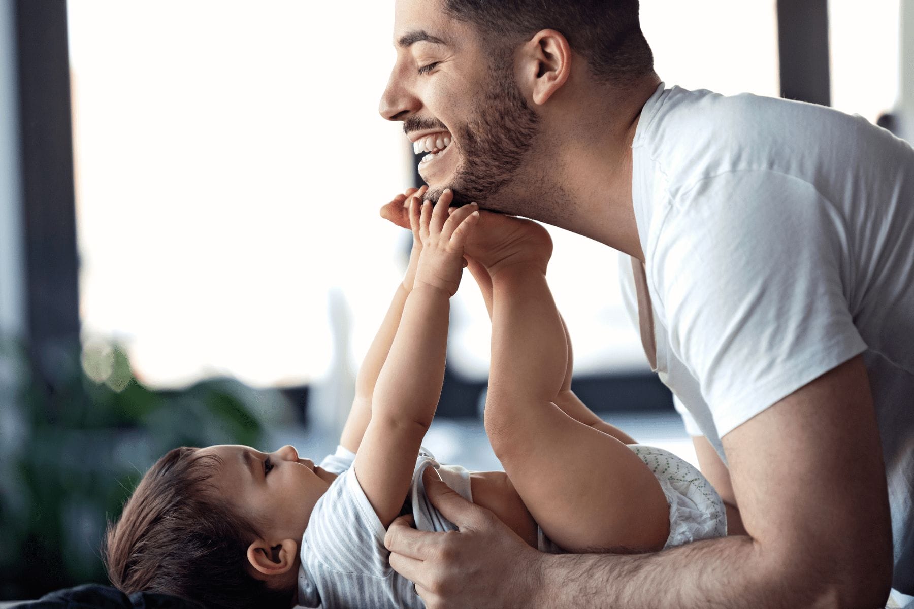 dad happy diaper change