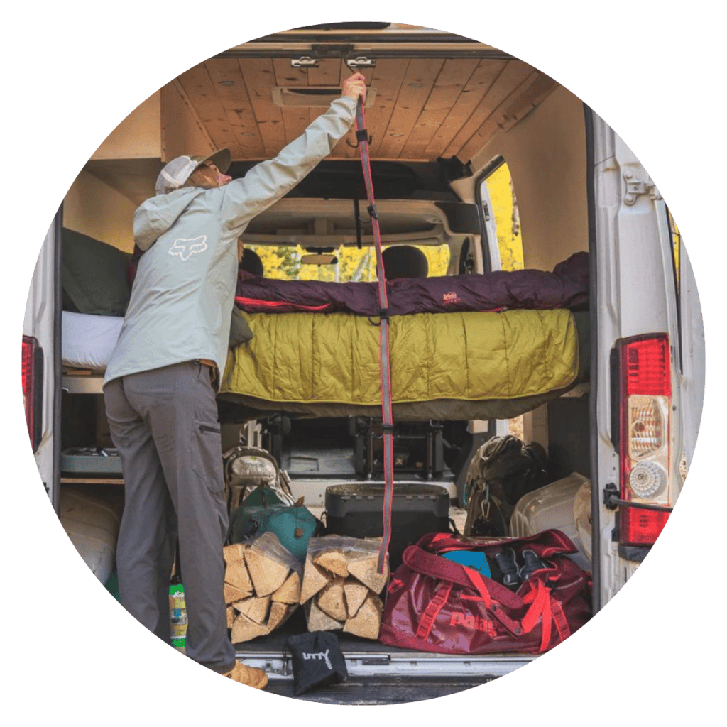 Man hangs UTTy organizer in the back of his travel van