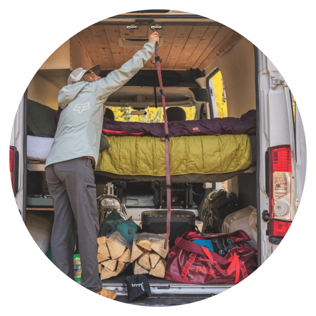 Man hangs UTTy organizer in the back of his travel van