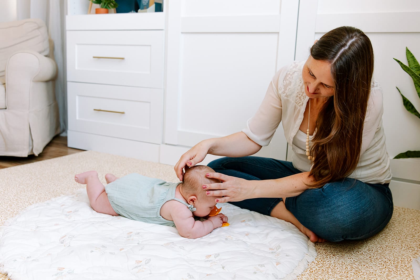 Shari Stamps doing infant craniosacral therapy